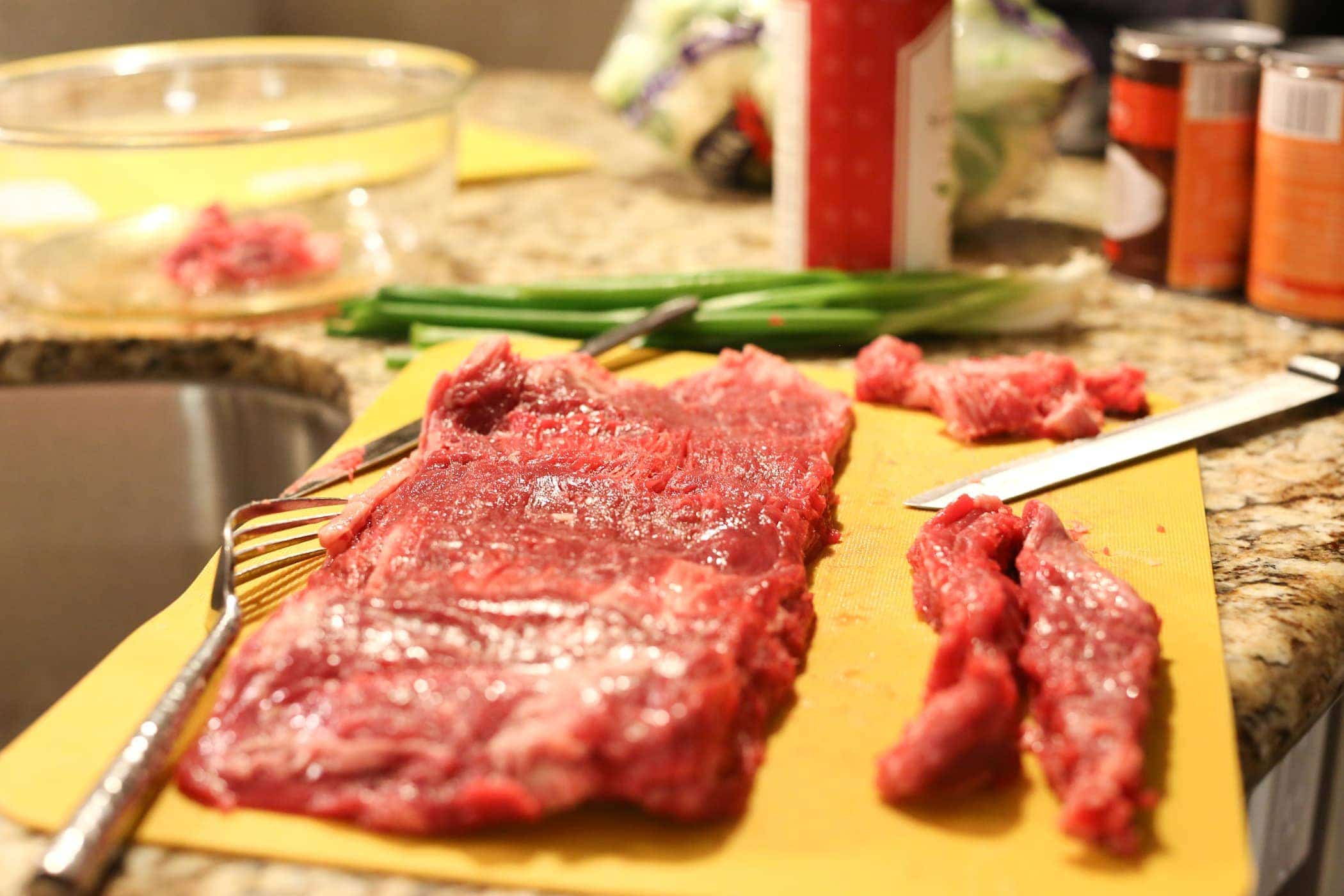 raw meat on cutting board