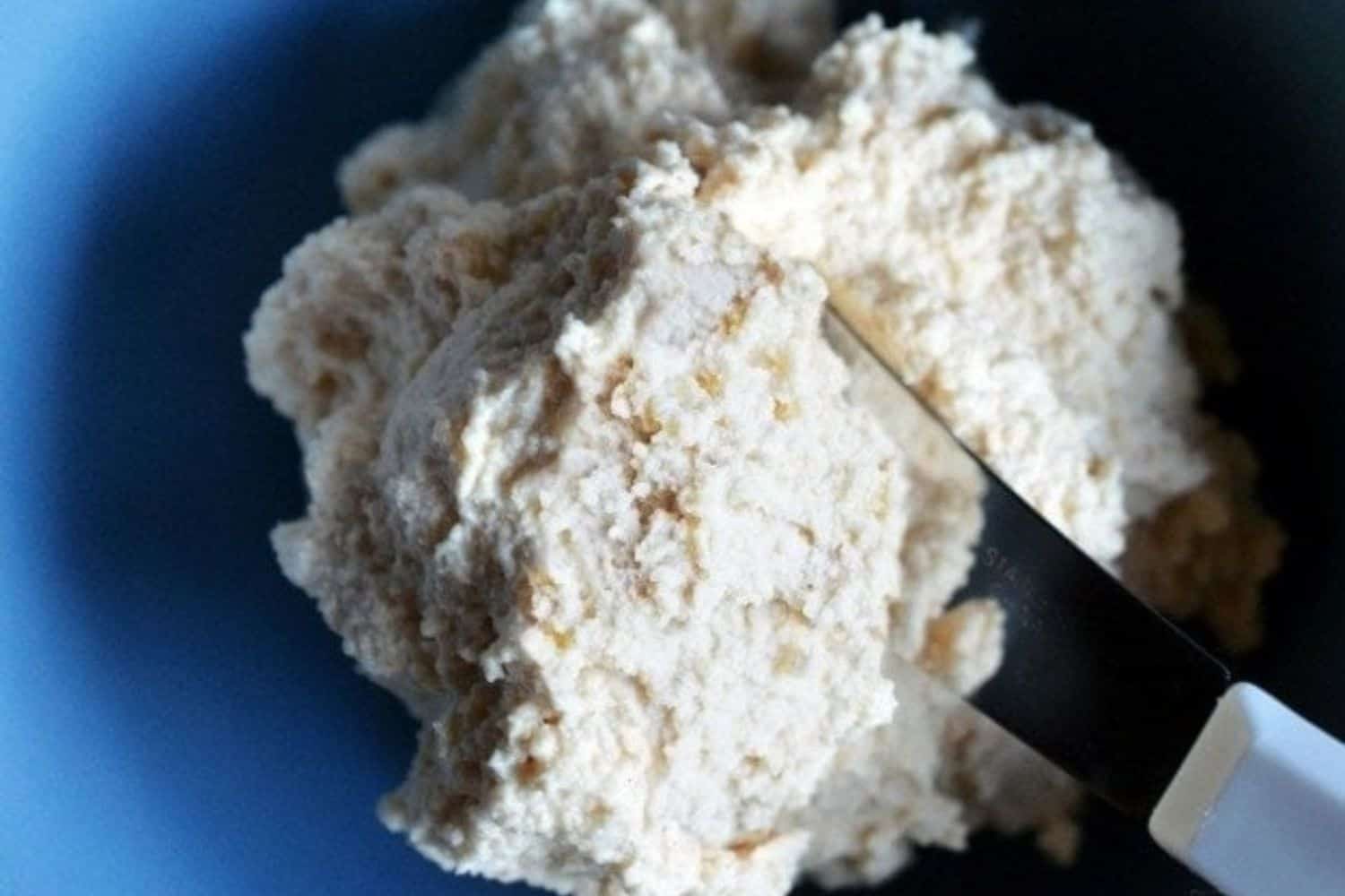 vegan ricotta cheese in a blue bowl