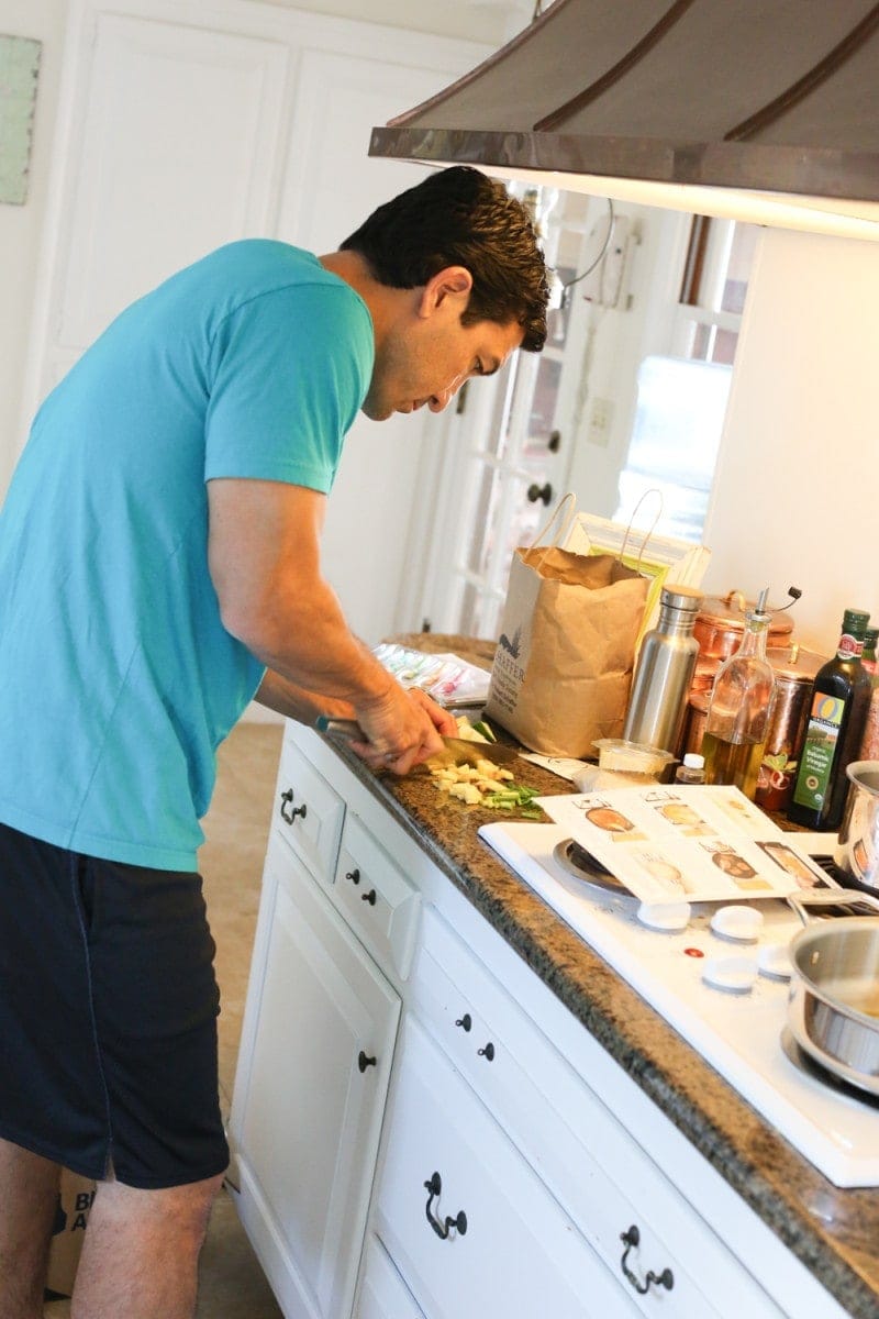 man cooking in kitchen