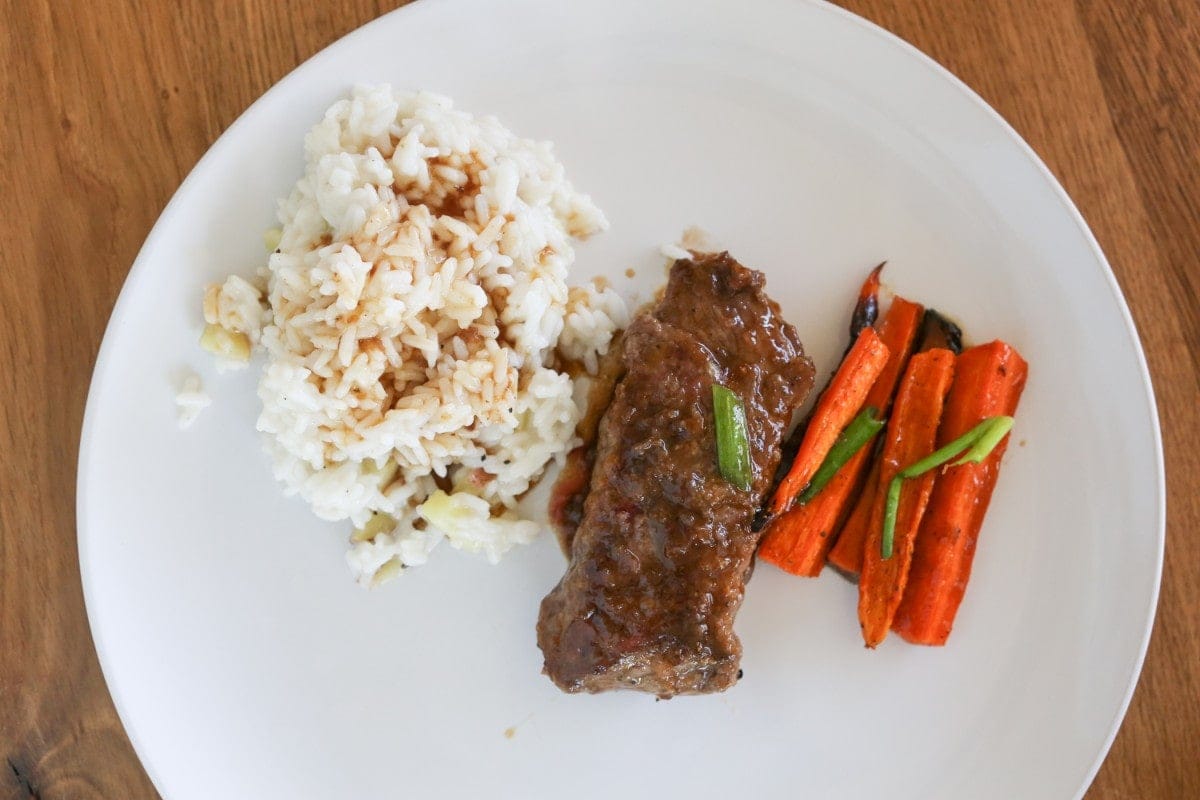 dinner with rice meat carrots