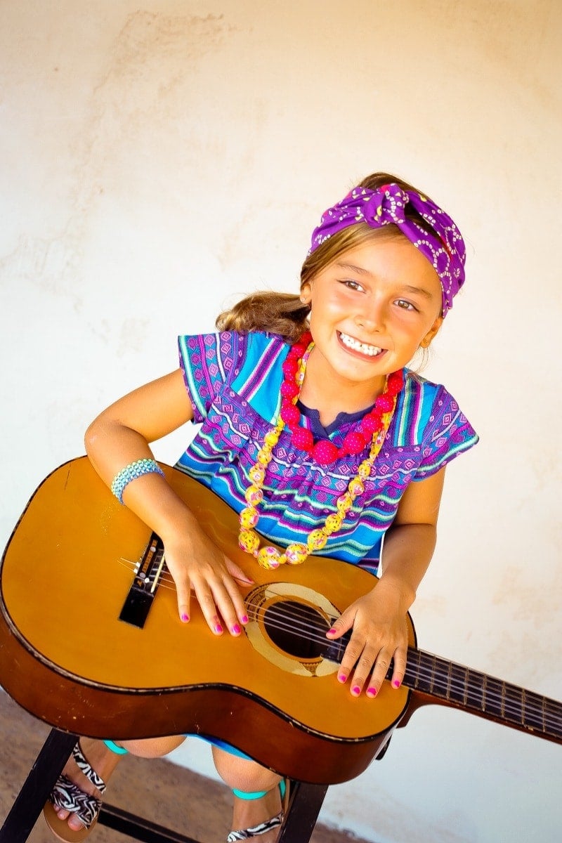 girl playing guitar