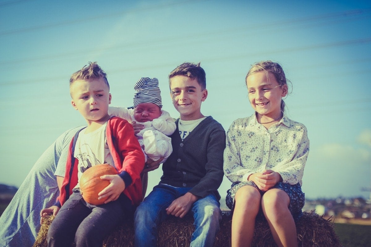 kids in pumpkin patch