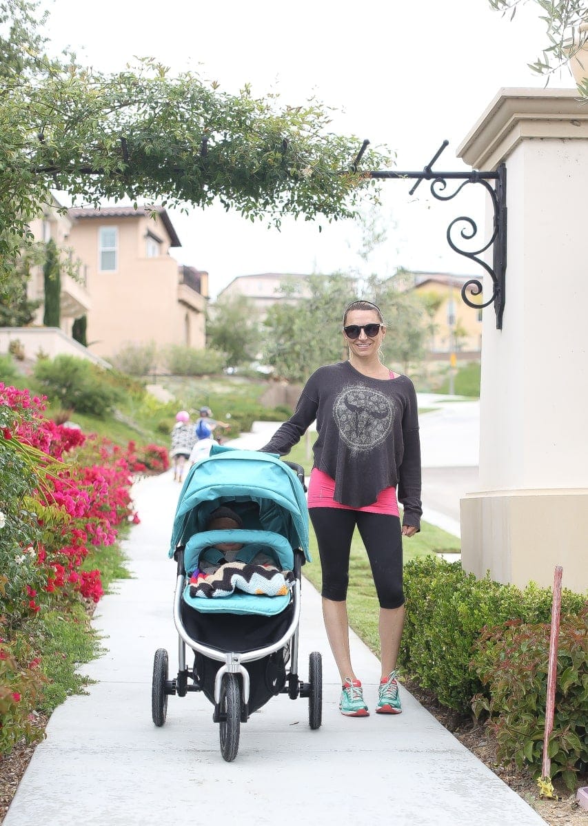 mom walking baby with stroller