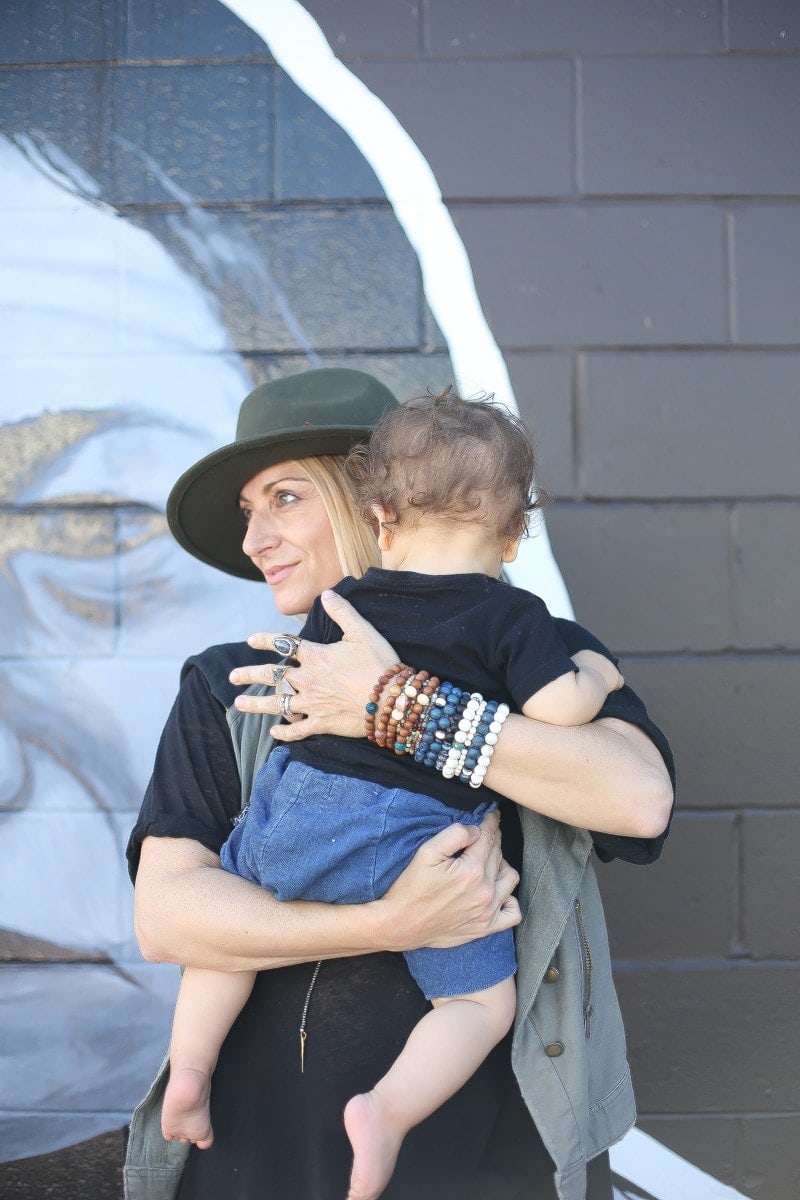 mom holding baby