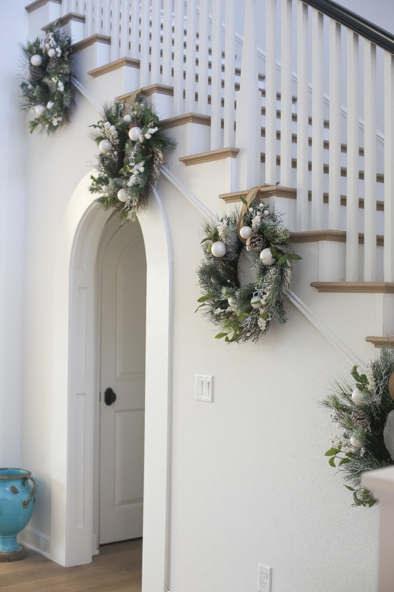 entryway wreath stairs