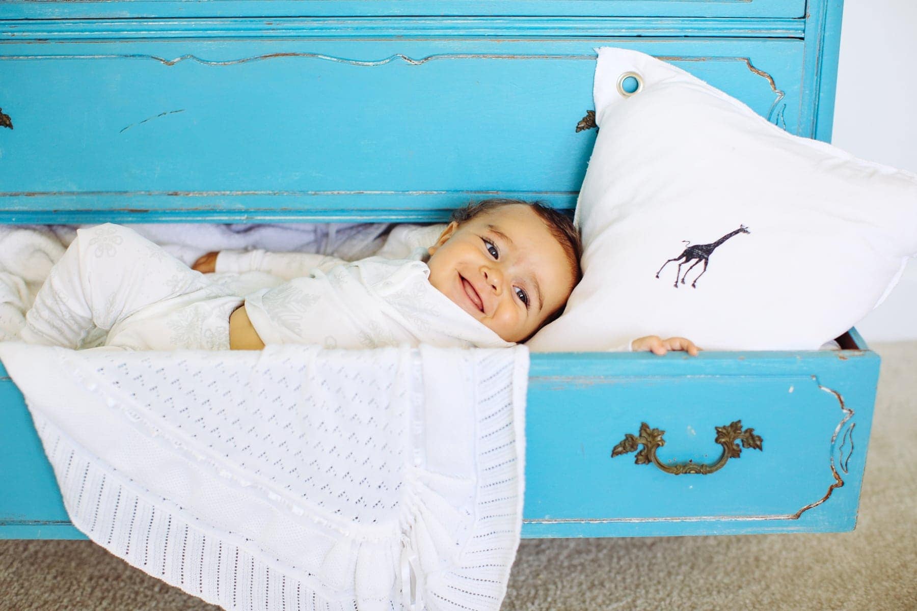 baby in dresser drawer