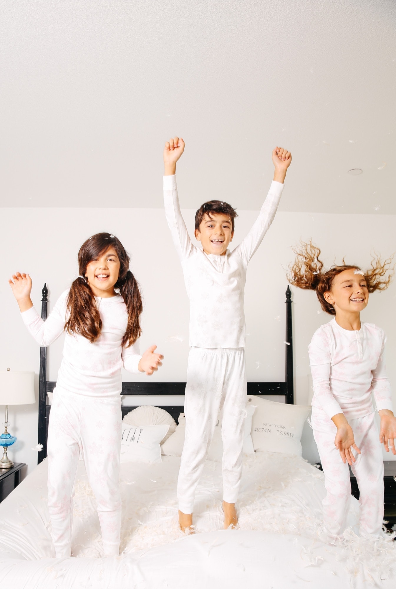 kids jumping on bed