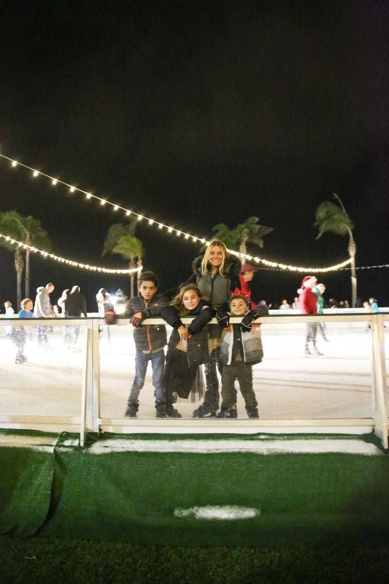 mother and children ice skating