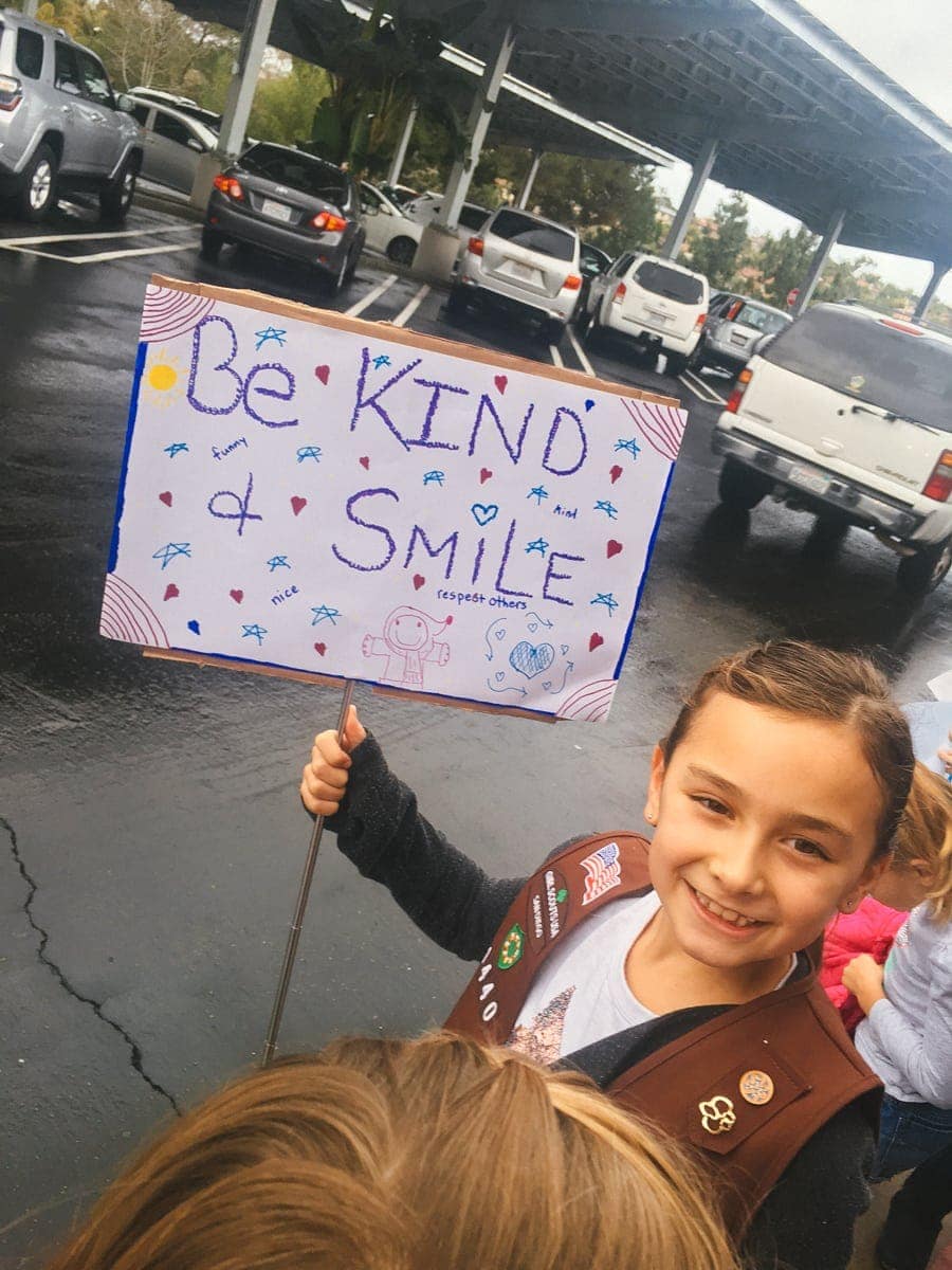 kid with be kind sign