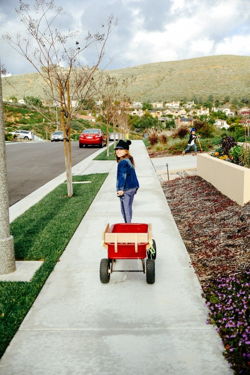 girl pulling wagon 
