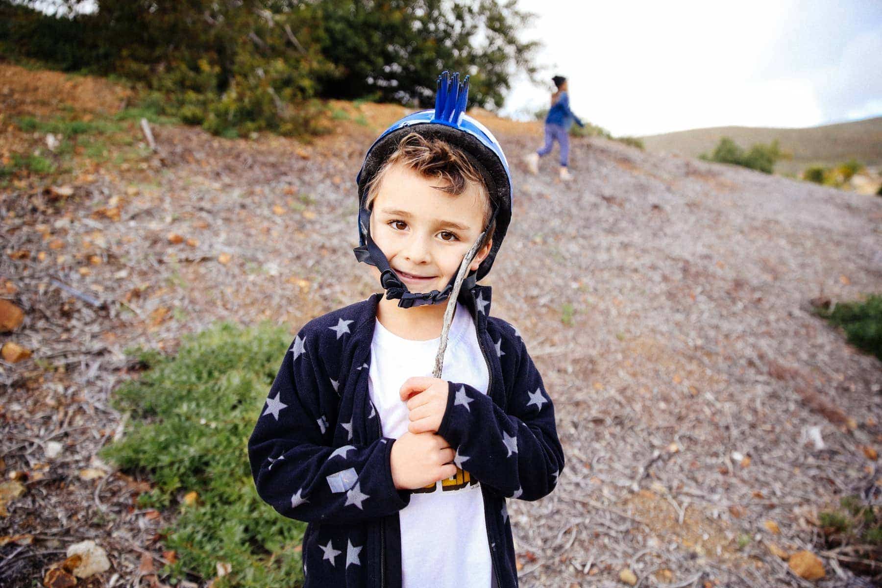 child in helmet