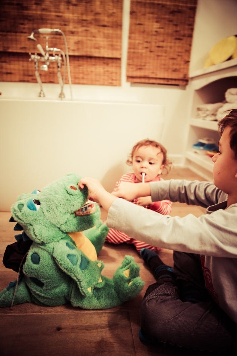 baby brushing teeth