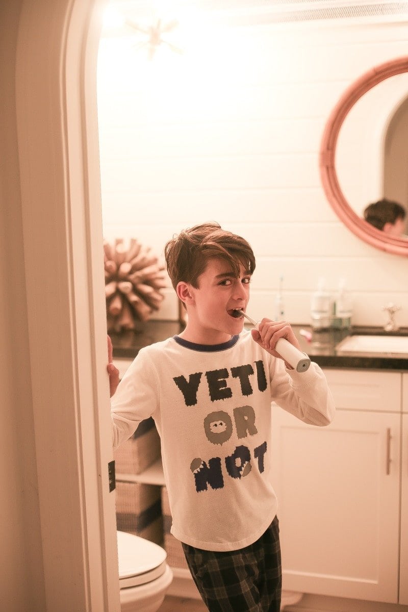 boy brushing teeth