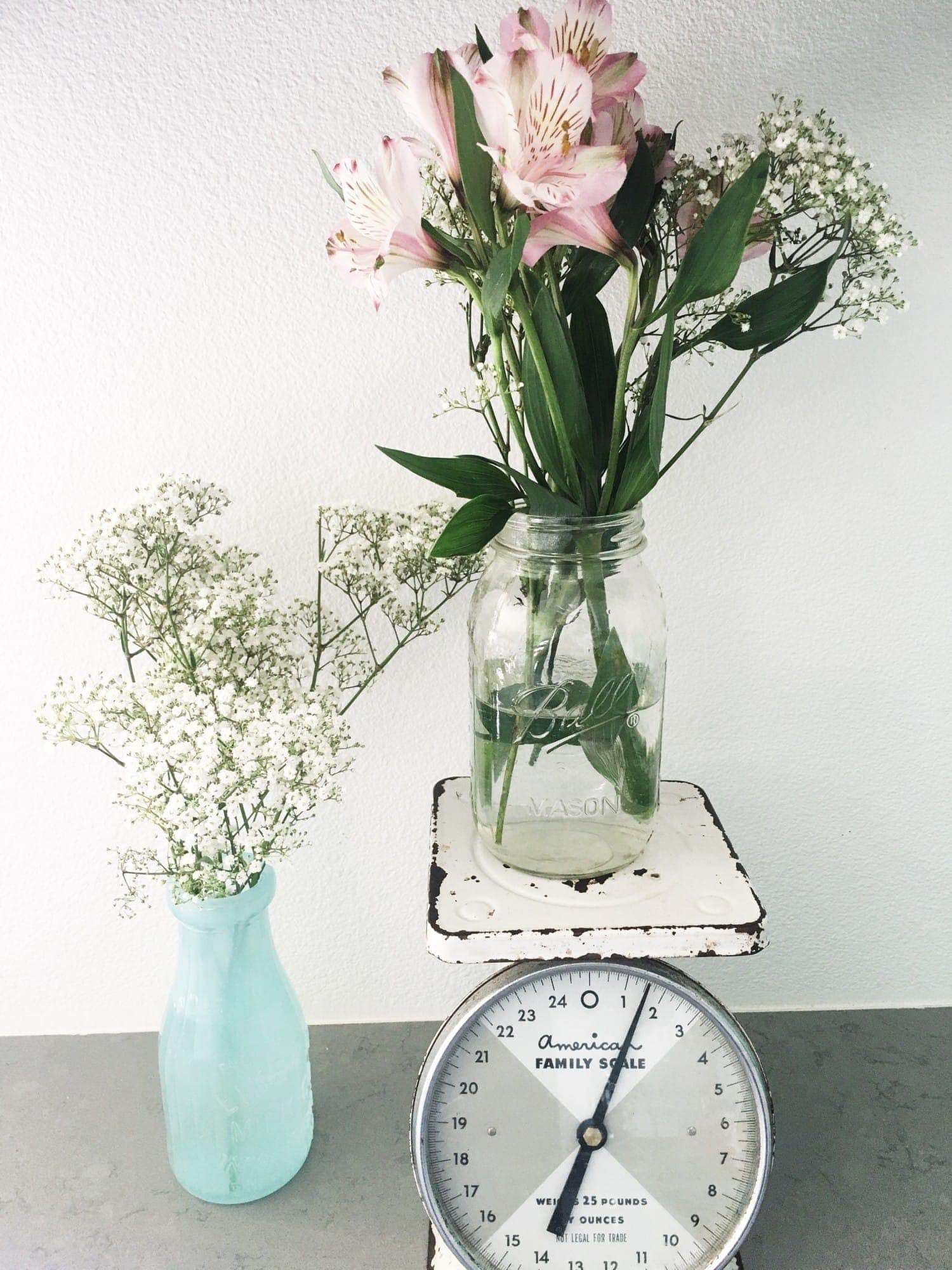 antique scale with flowers