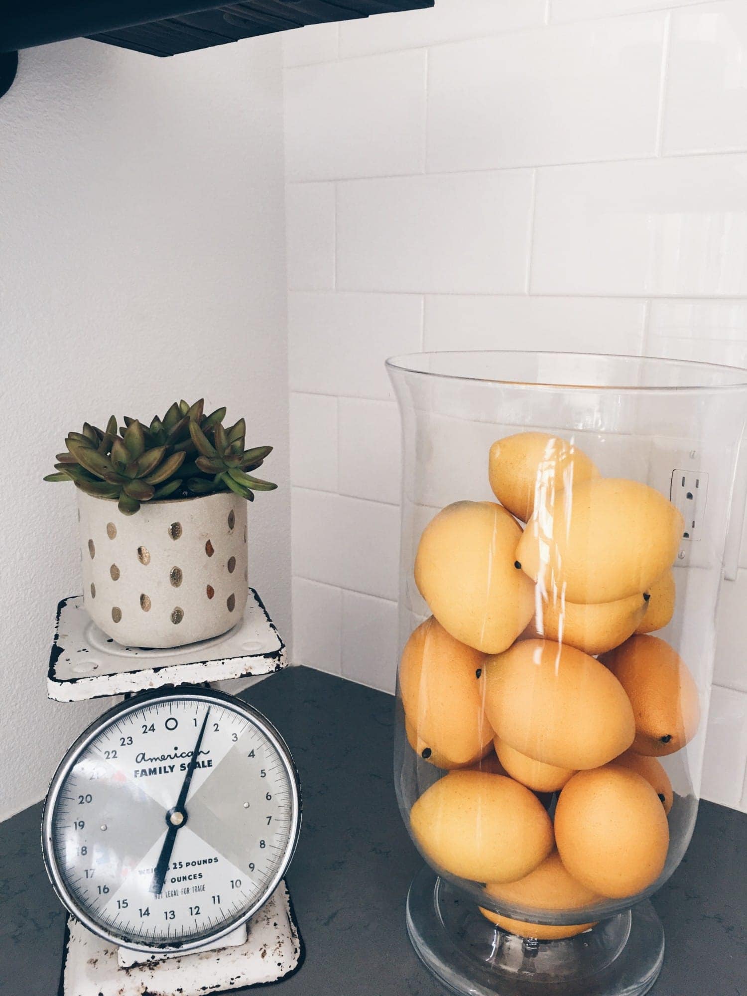 lemons in glass vase