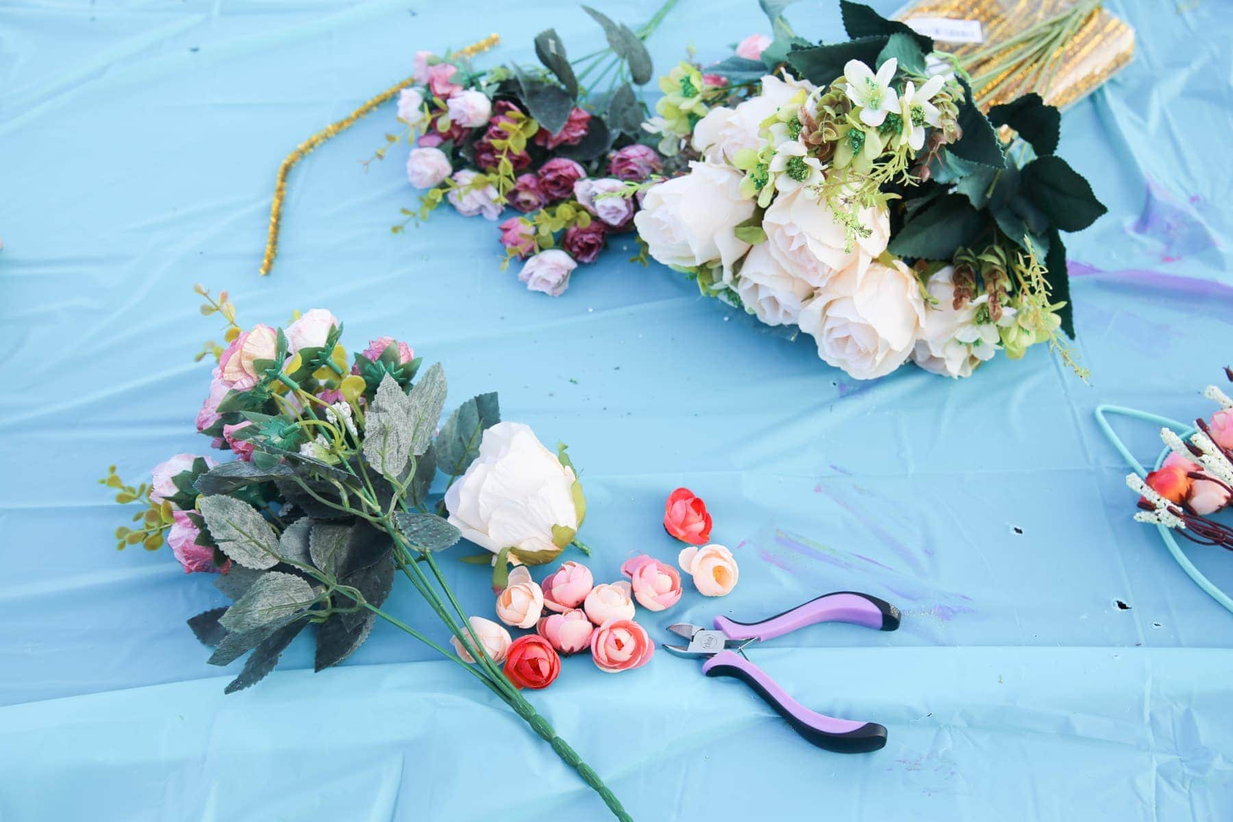 craft flowers on blue background