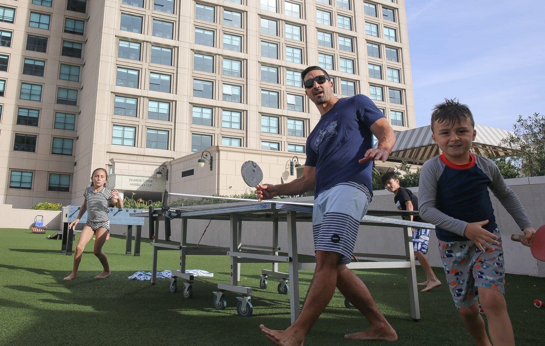 dad and kids playing 