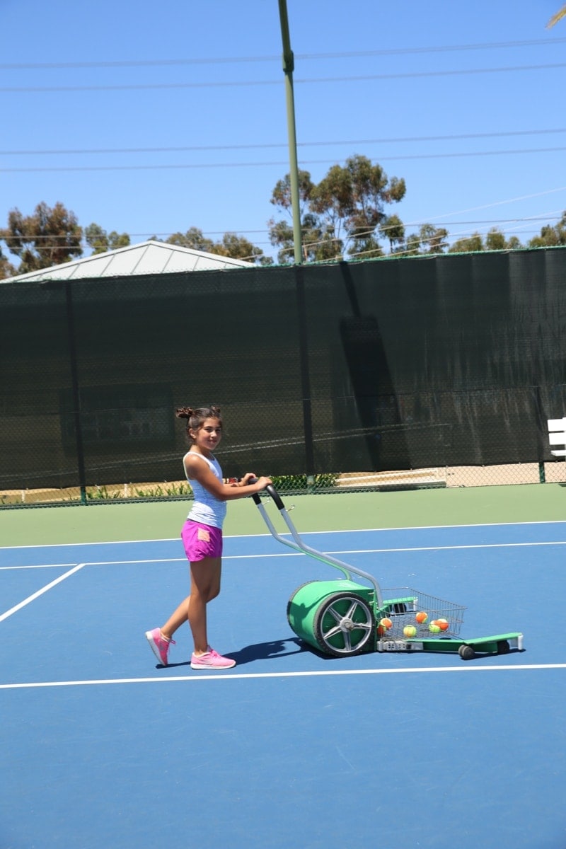 girl playing tennis 