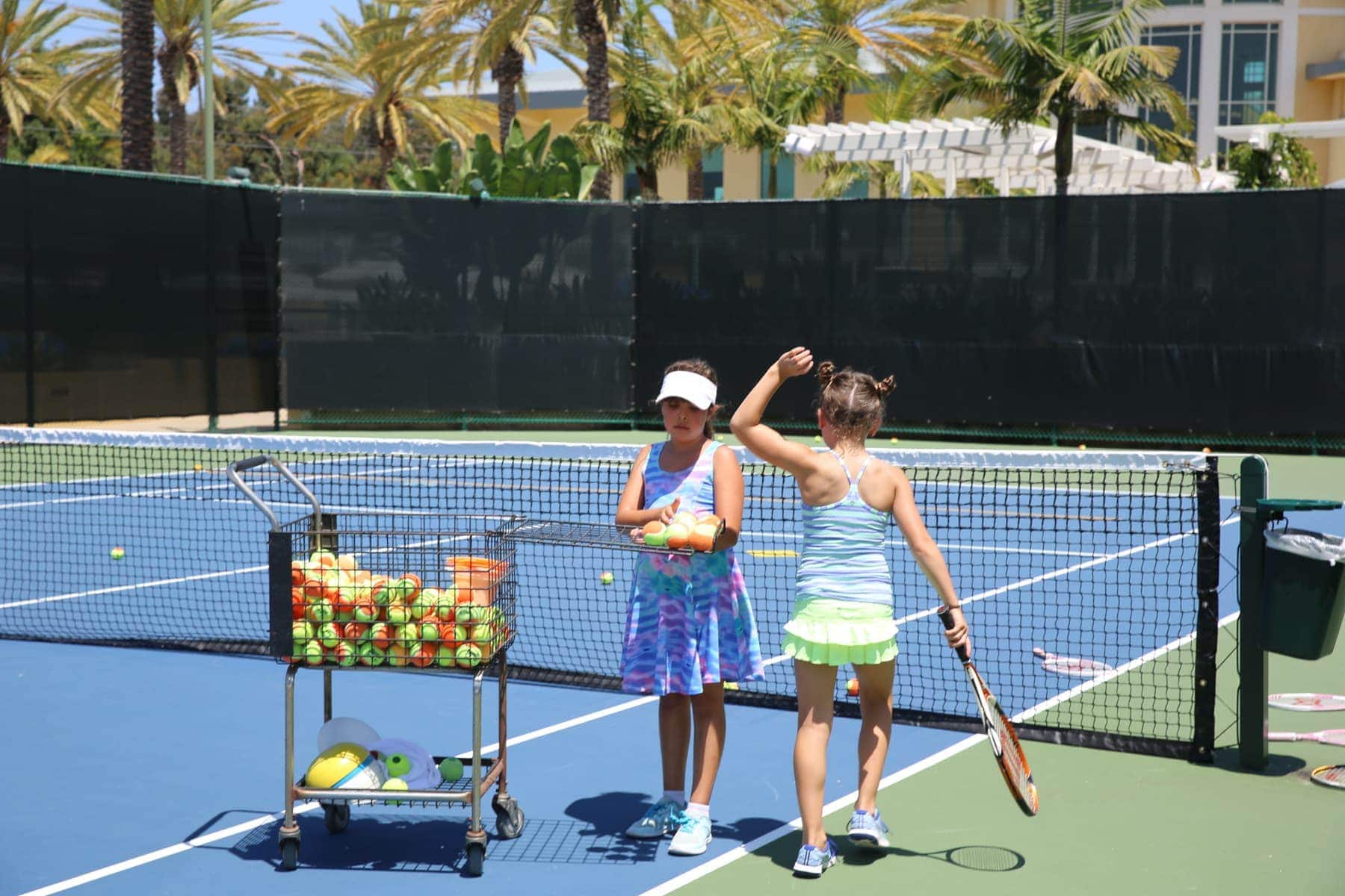 girls playing tennis 