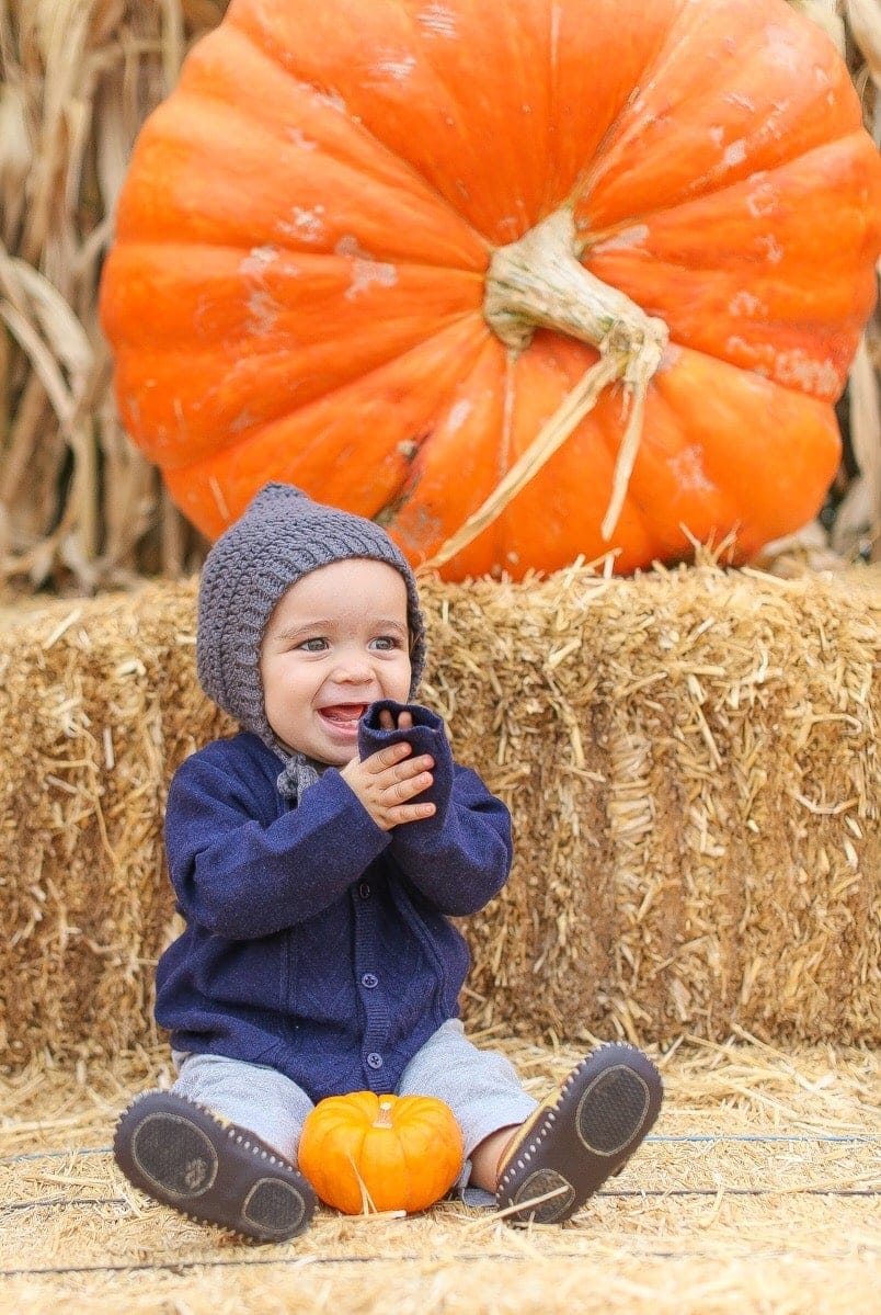 baby and pumpkin