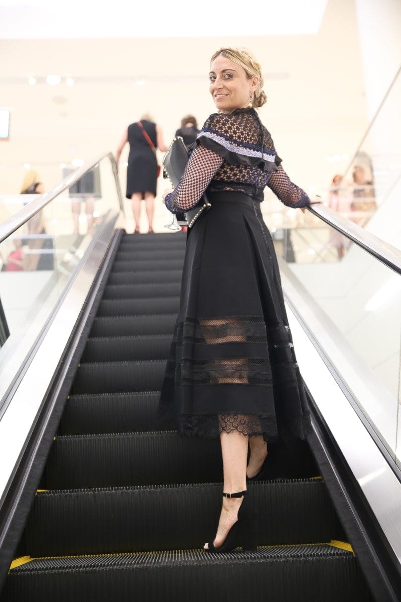 woman on escalator 