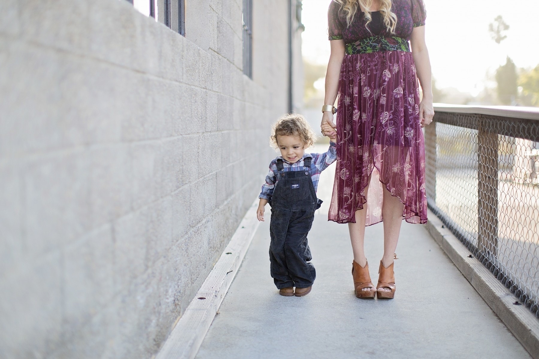 Brody and Mommy walking hand in hand