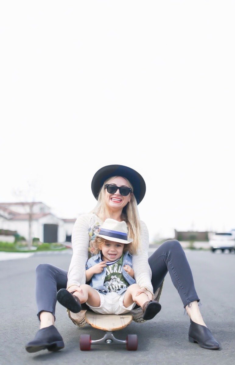 mom and son on skateboard