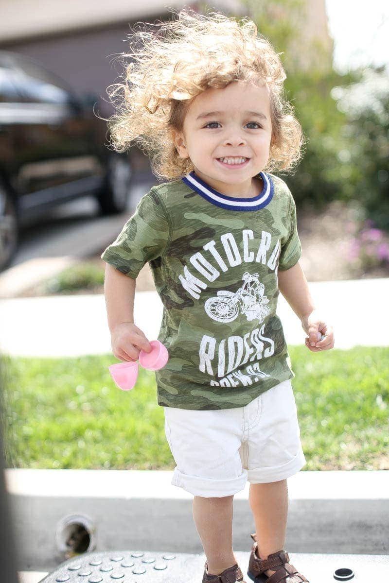 boy with wind blowing