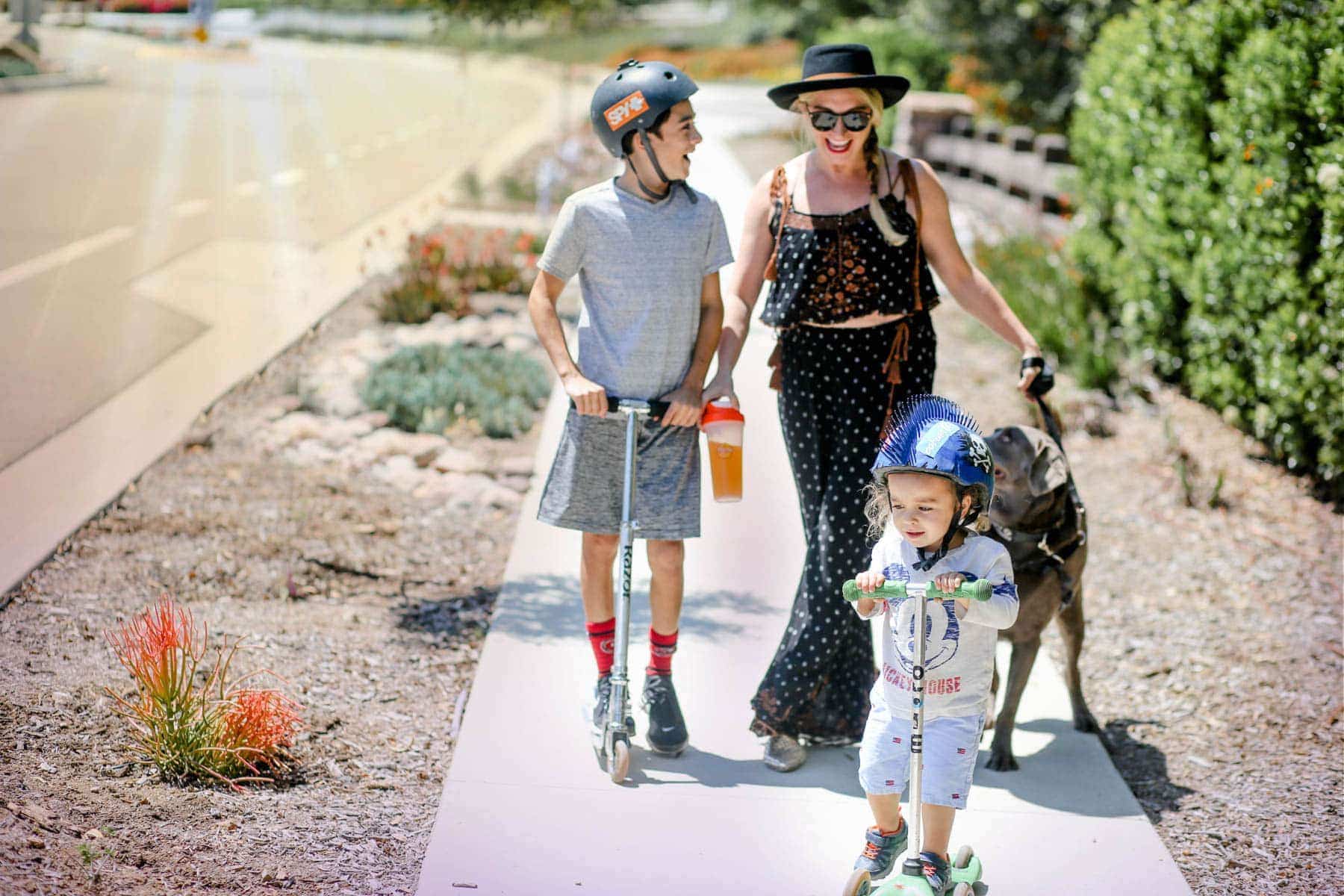 mother with children and dog