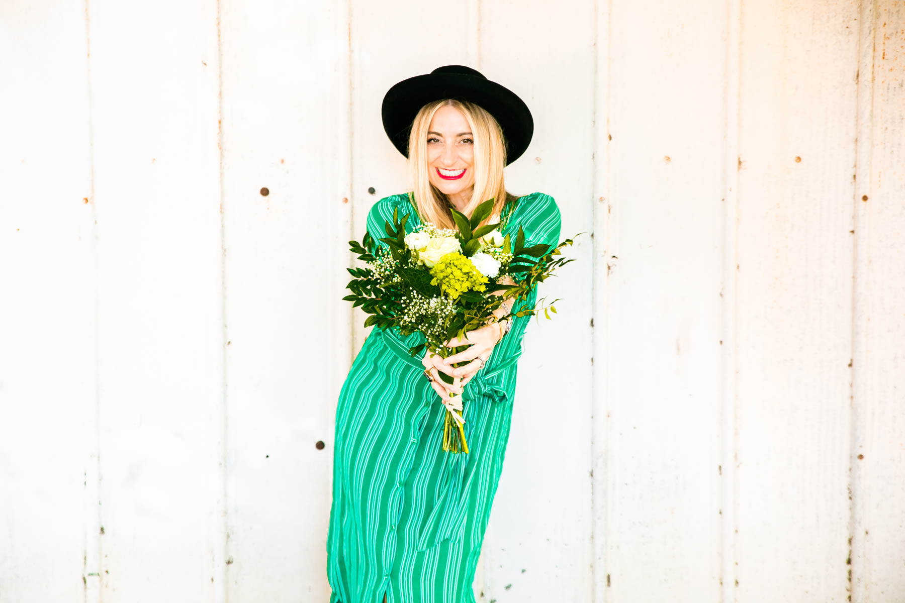 woman holding flowers