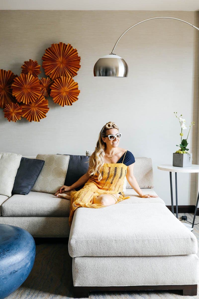 Mom in a stylish bedroom #citygirlgonemom #hyattregency #lajollasandiego #lajolla