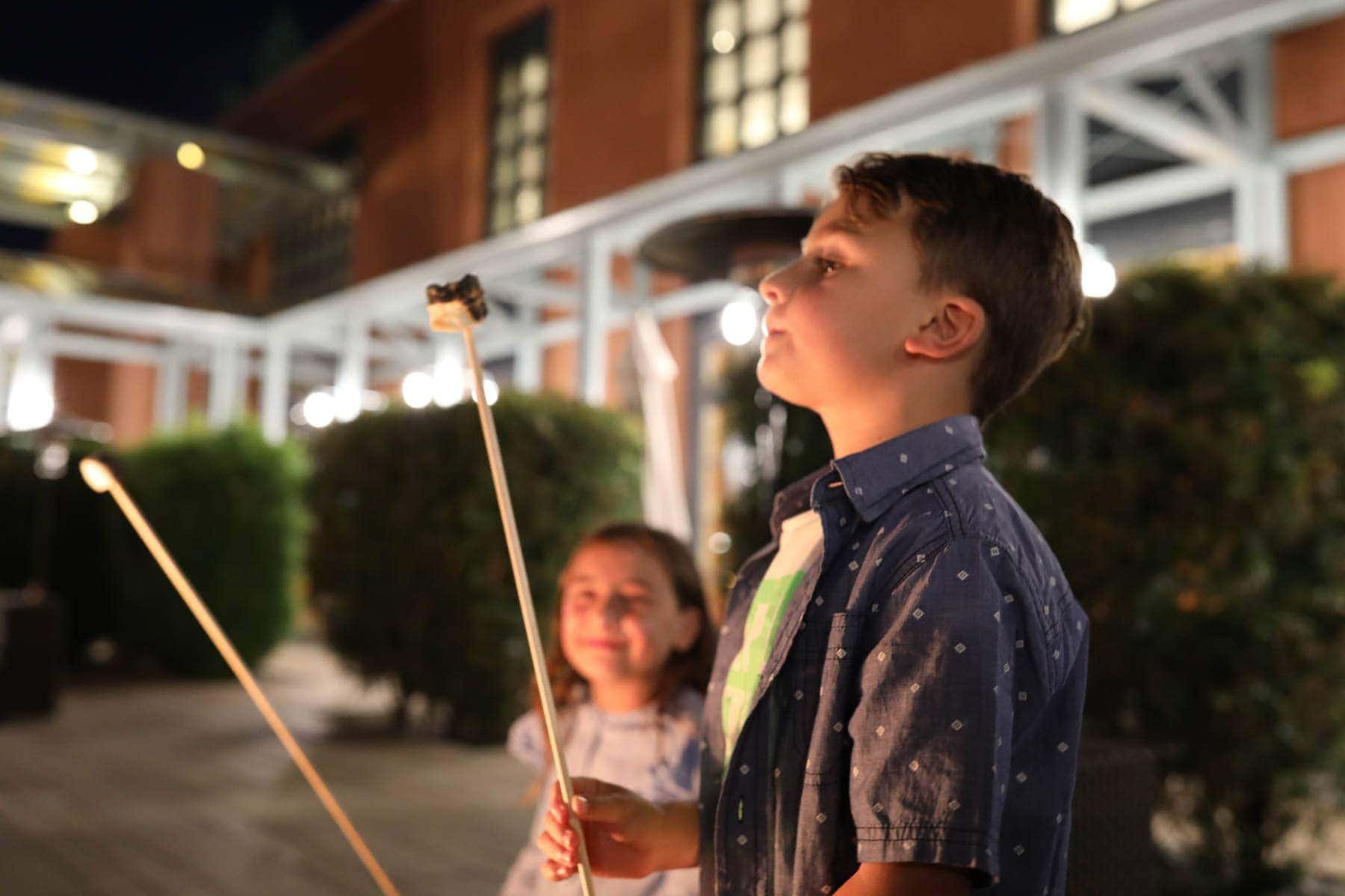 kids roasting marshmallows