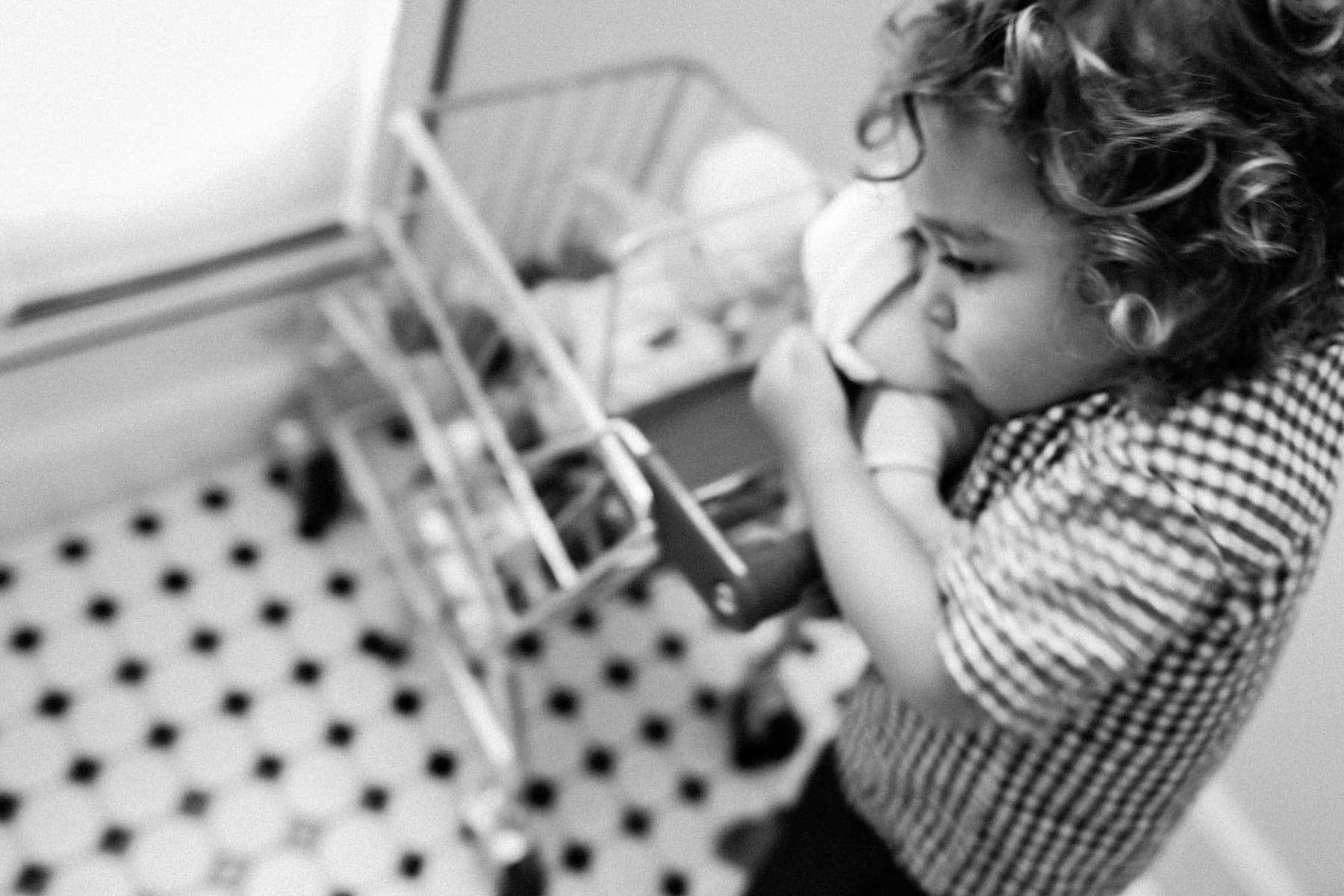 Boy Hugging a Doll