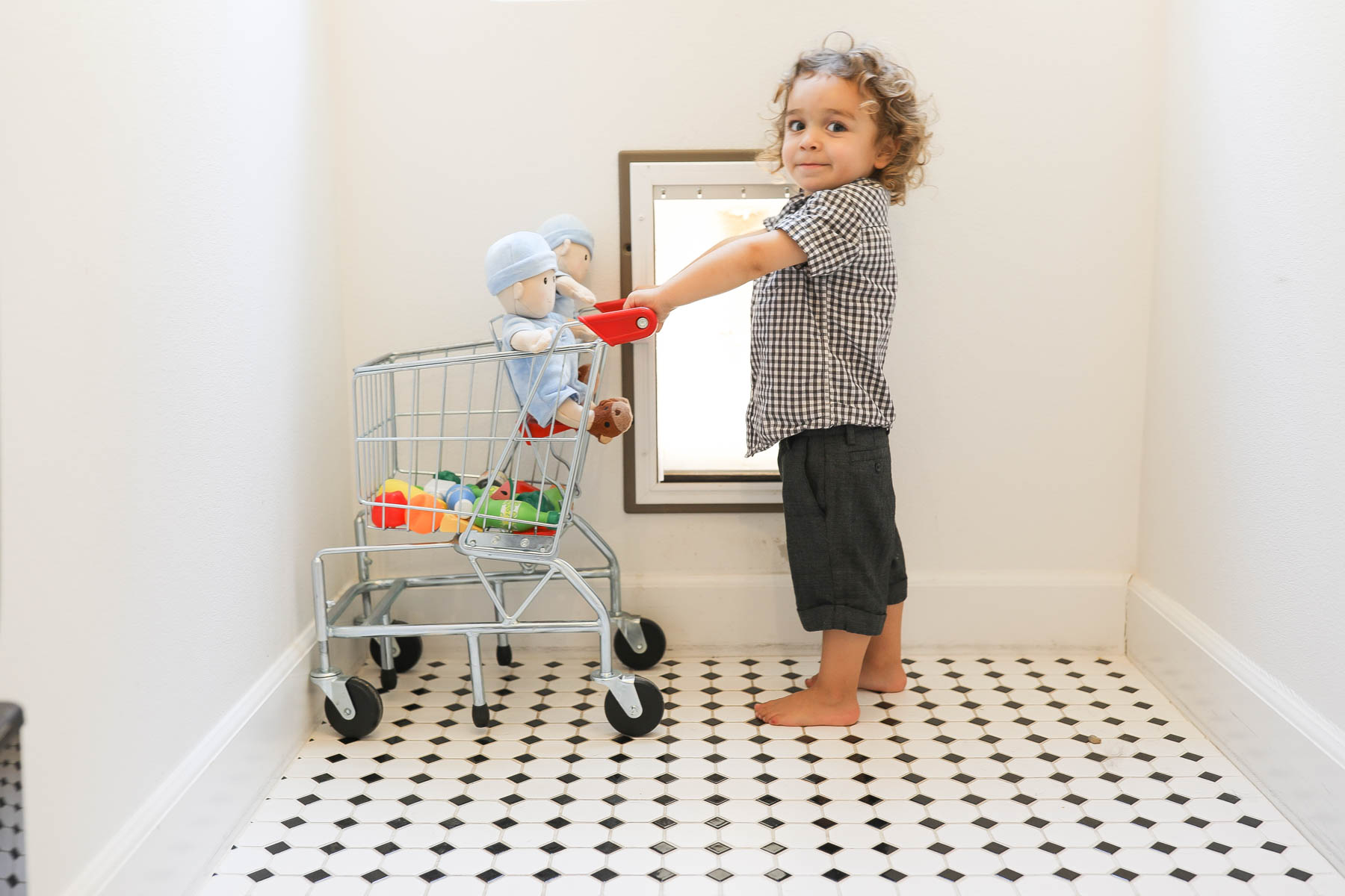 boy with shopping cart