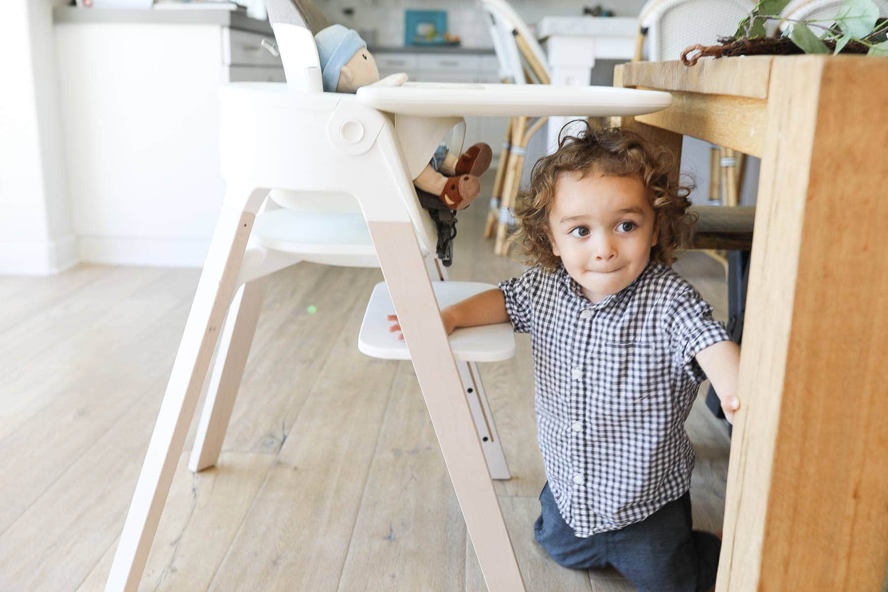 Cute Kid Under the Table