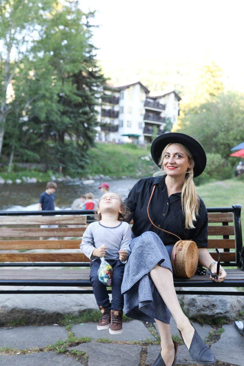 mom and kid on bench