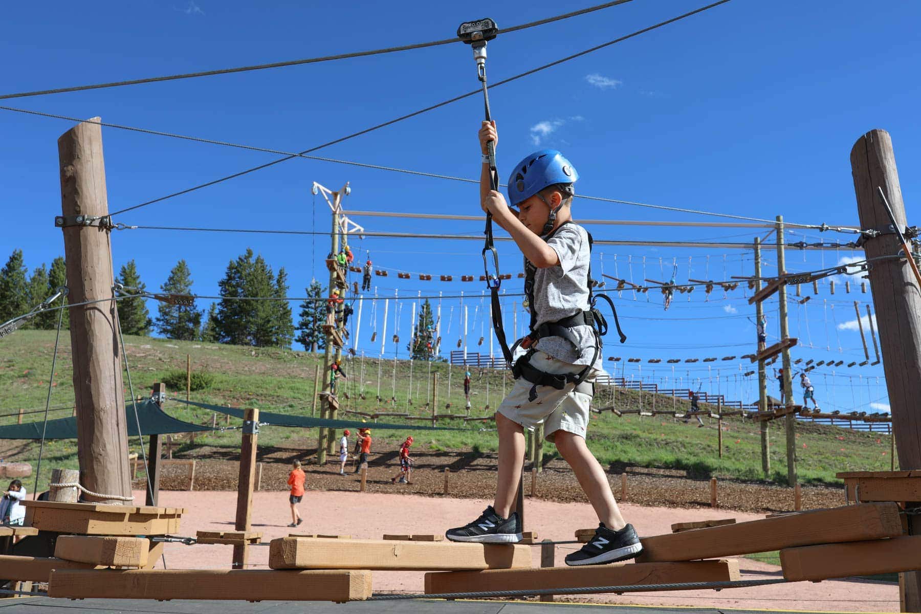 kid in new balance obstacle course