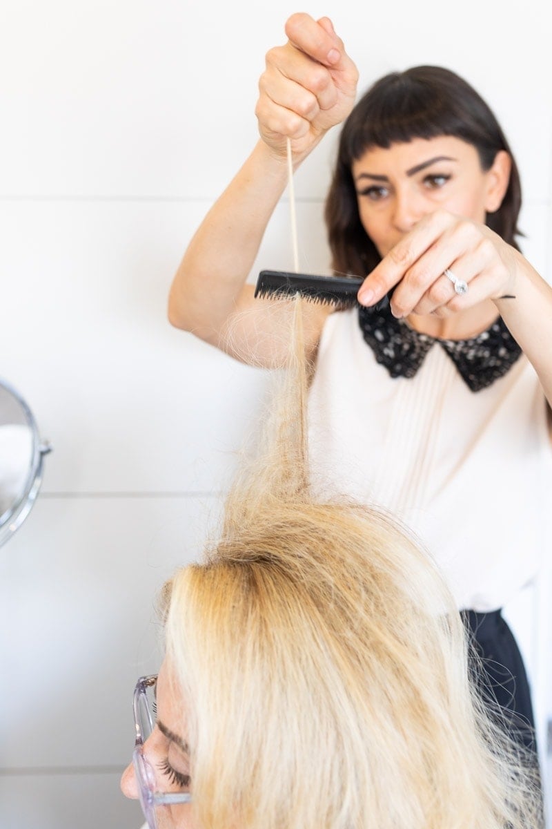 Step 1: Hairstylist Preparing the Strands of Hair #pinuptutorial #vintagehairstyle #hairstyle #citygirlgonemom #hairstyle #hairstyling #vintagewaves #vintagelook #hair