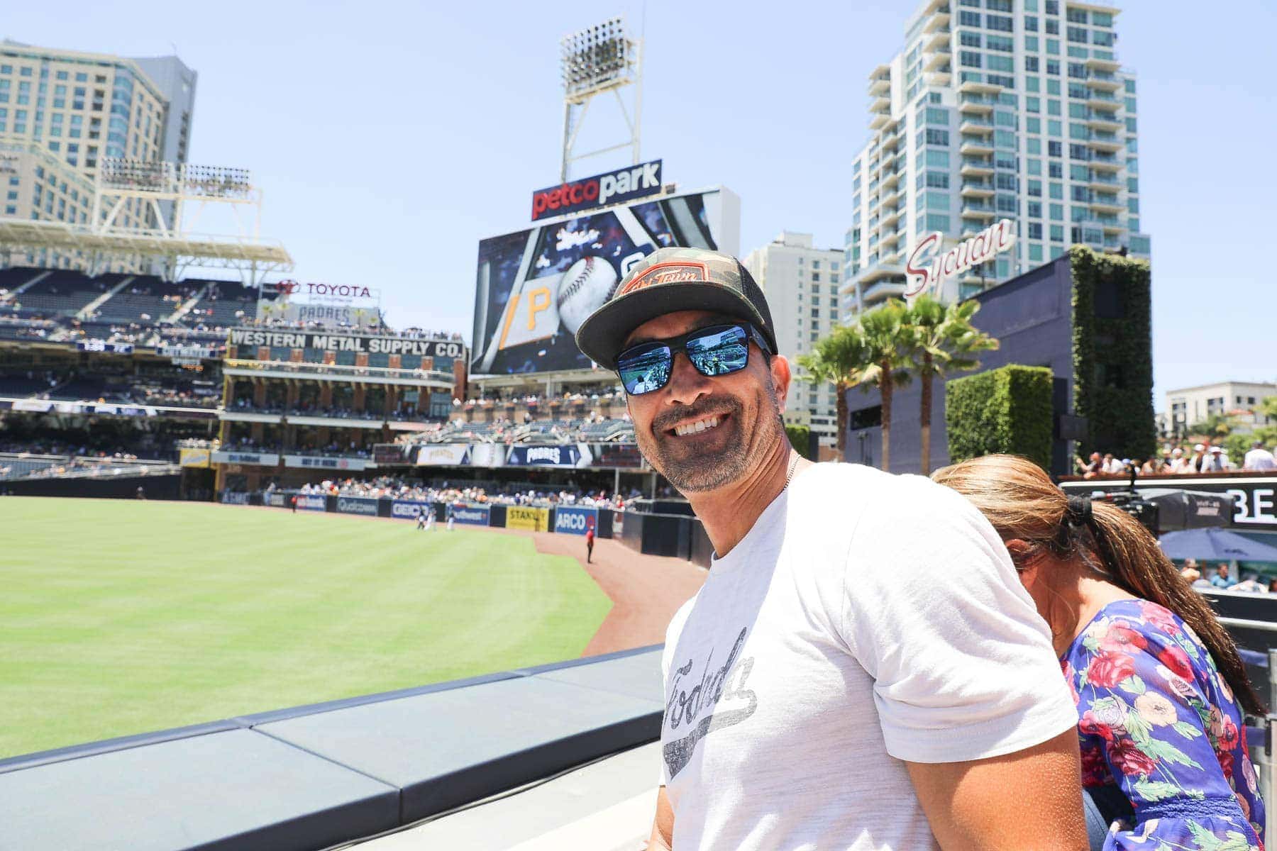 Man Smiling inside the Baseball Stadium #familyday #weekend #familydaysout #citygirlgonemom