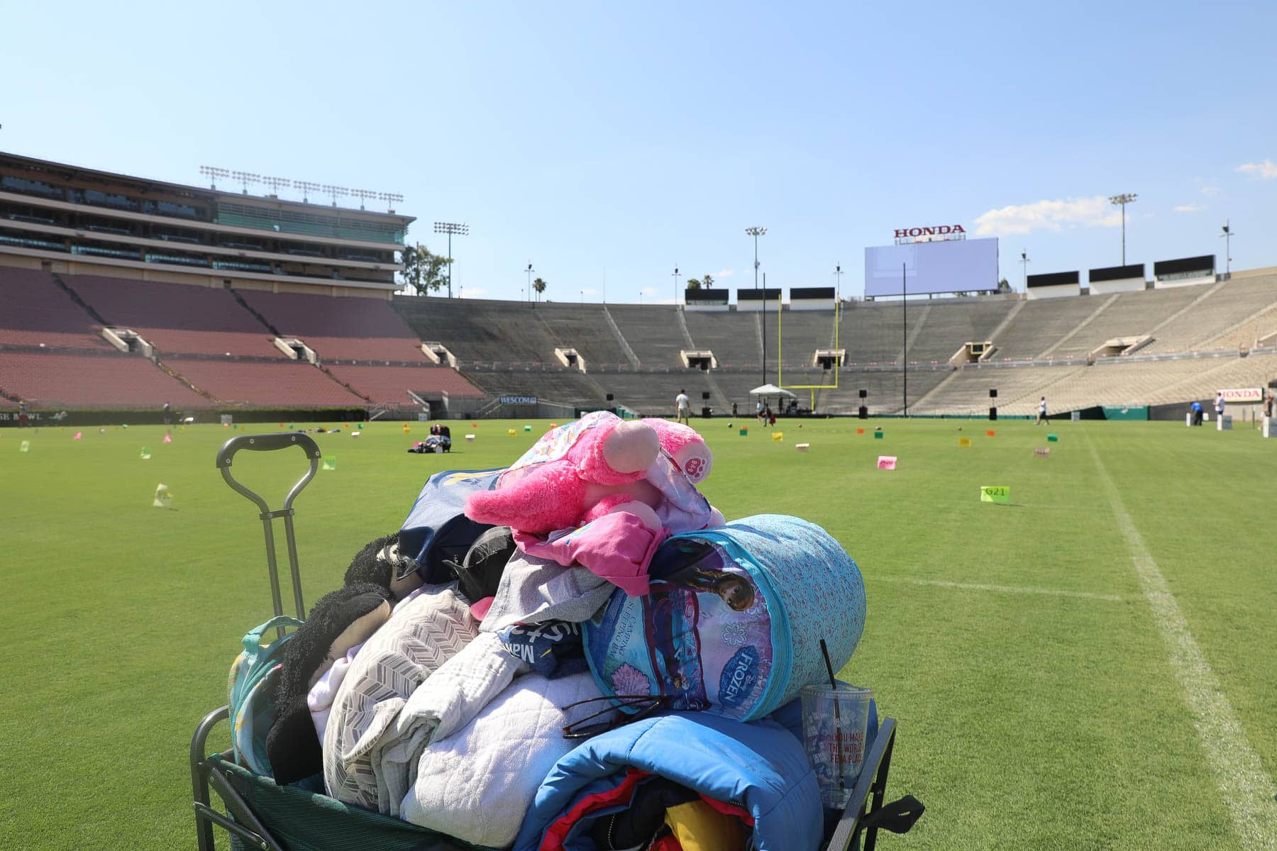 Childhood Cancer is an awful diagnosis. All kids deserve a night to remember and that's exactly what Northwestern Mutual did for their night to remember at the Rose Bowl Stadium! #childhoodcancerawareness #rosebowlstadiumcampout #campoutforkids #cancerawareness #rosebudscampout #rosebowlstadium #pasadena #california #citygirlgonemom #camping #footballstadium