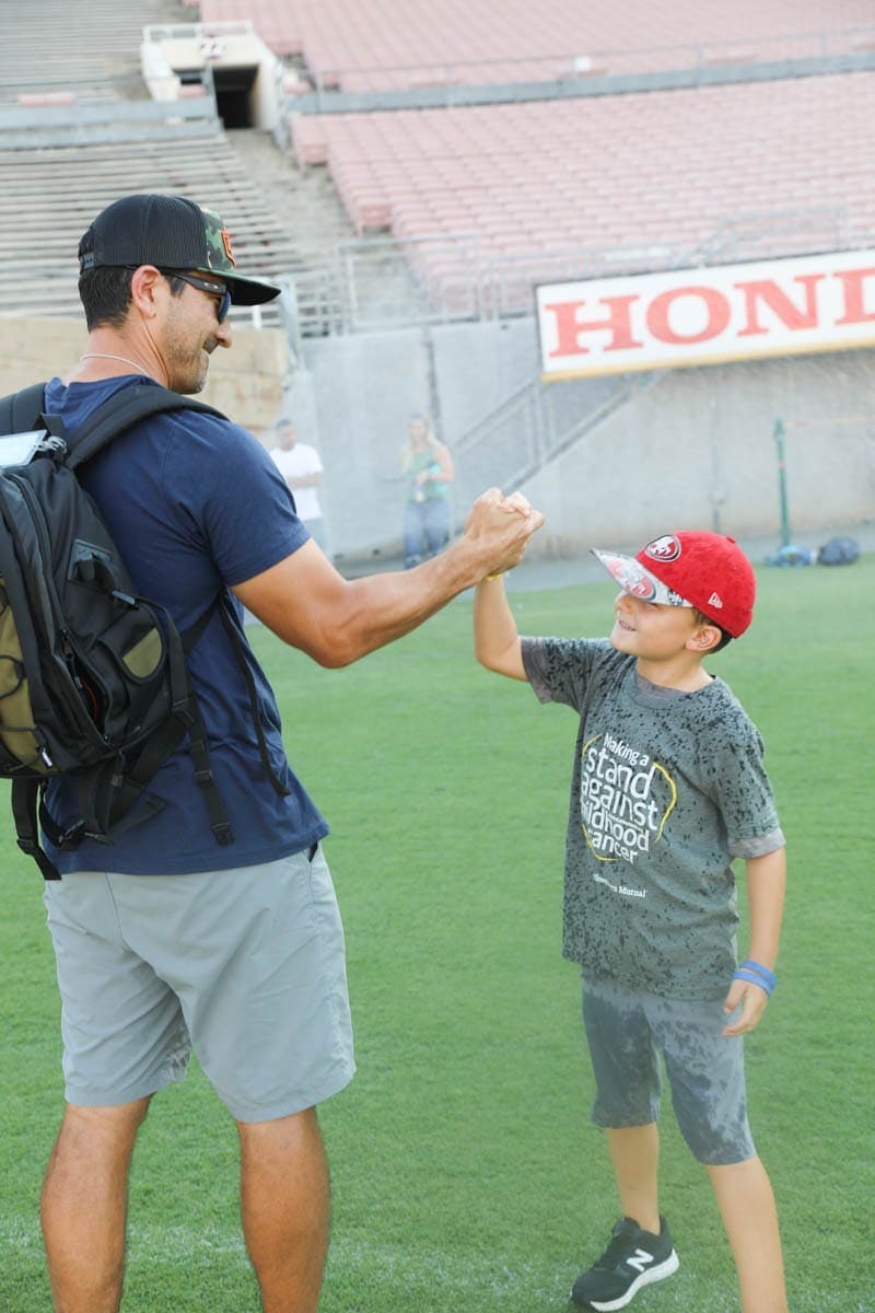 Childhood Cancer is an awful diagnosis. All kids deserve a night to remember and that's exactly what Northwestern Mutual did for their night to remember at the Rose Bowl Stadium! #childhoodcancerawareness #rosebowlstadiumcampout #campoutforkids #cancerawareness #rosebudscampout #rosebowlstadium #pasadena #california #citygirlgonemom #camping #footballstadium