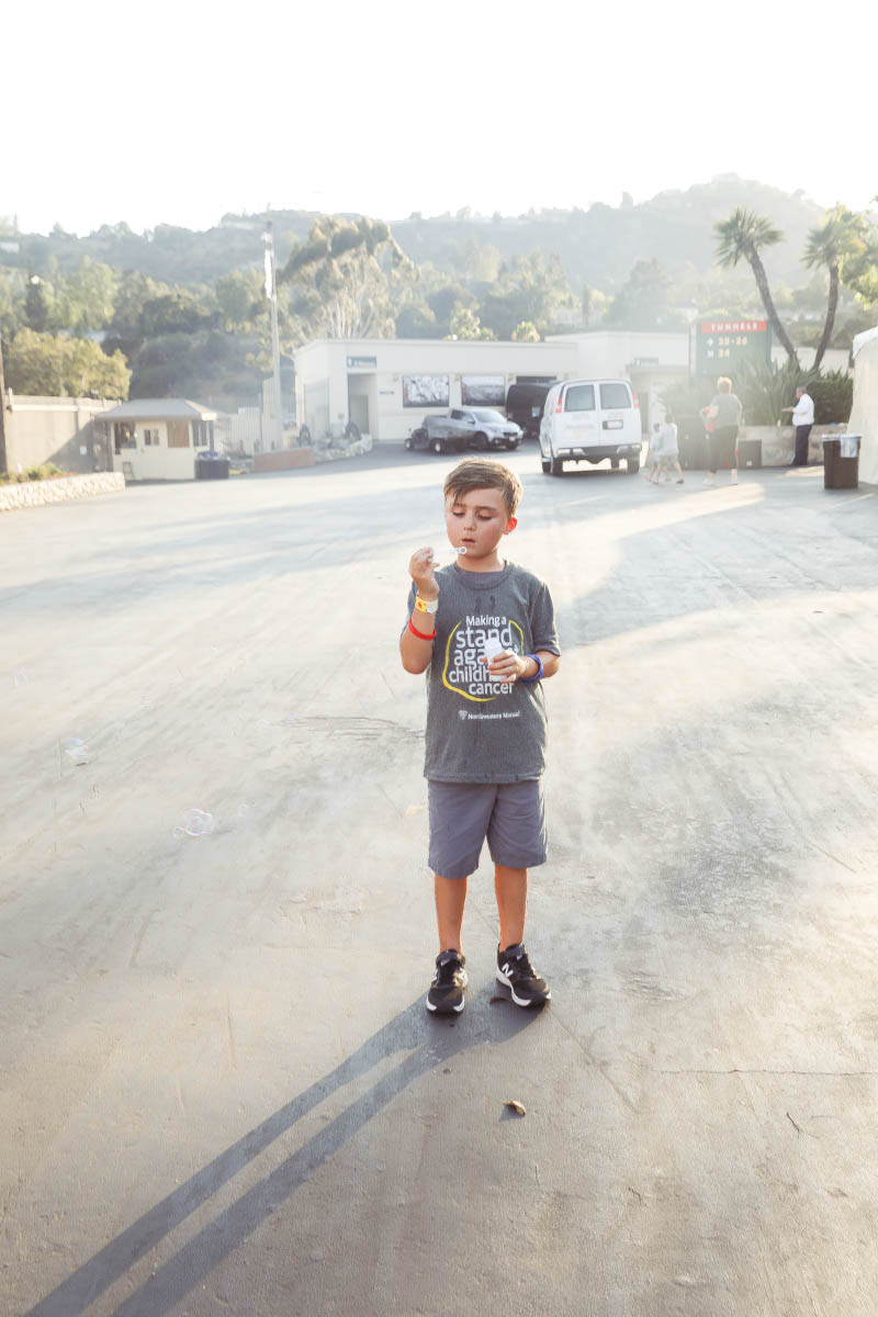 Childhood Cancer is an awful diagnosis. All kids deserve a night to remember and that's exactly what Northwestern Mutual did for their night to remember at the Rose Bowl Stadium! #childhoodcancerawareness #rosebowlstadiumcampout #campoutforkids #cancerawareness #rosebudscampout #rosebowlstadium #pasadena #california #citygirlgonemom #camping #footballstadium