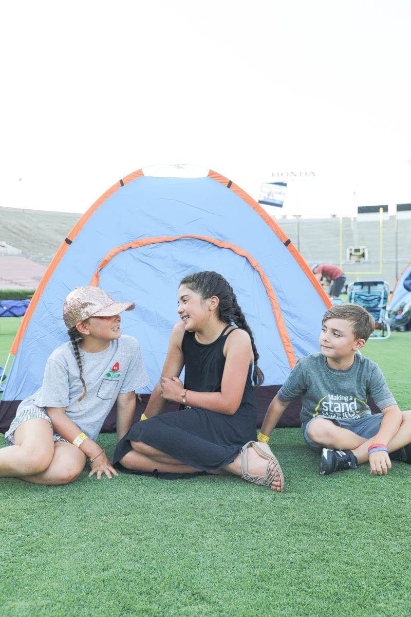 Childhood Cancer is an awful diagnosis. All kids deserve a night to remember and that's exactly what Northwestern Mutual did for their night to remember at the Rose Bowl Stadium! #childhoodcancerawareness #rosebowlstadiumcampout #campoutforkids #cancerawareness #rosebudscampout #rosebowlstadium #pasadena #california #citygirlgonemom #camping #footballstadium