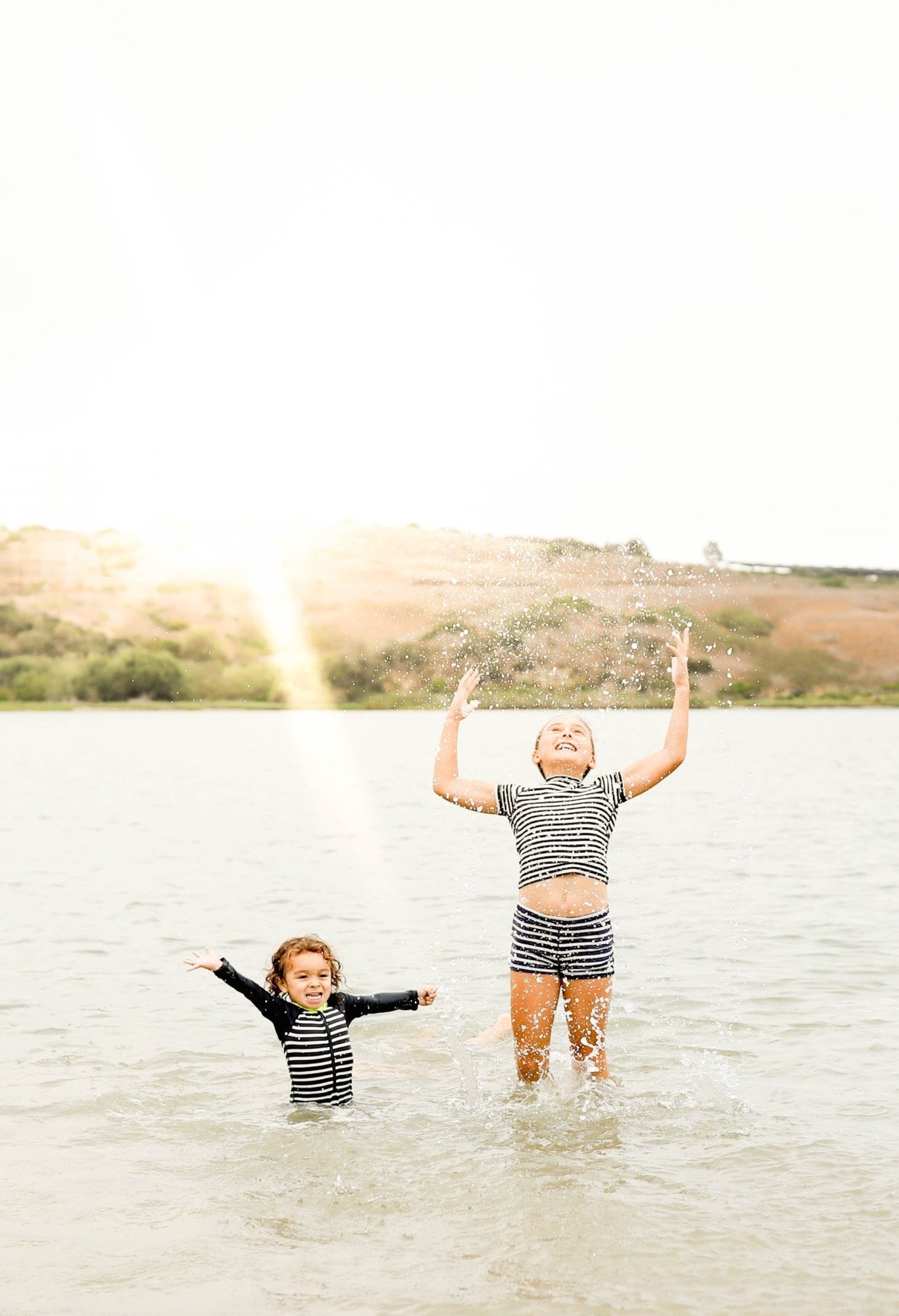 kids playing at the beach