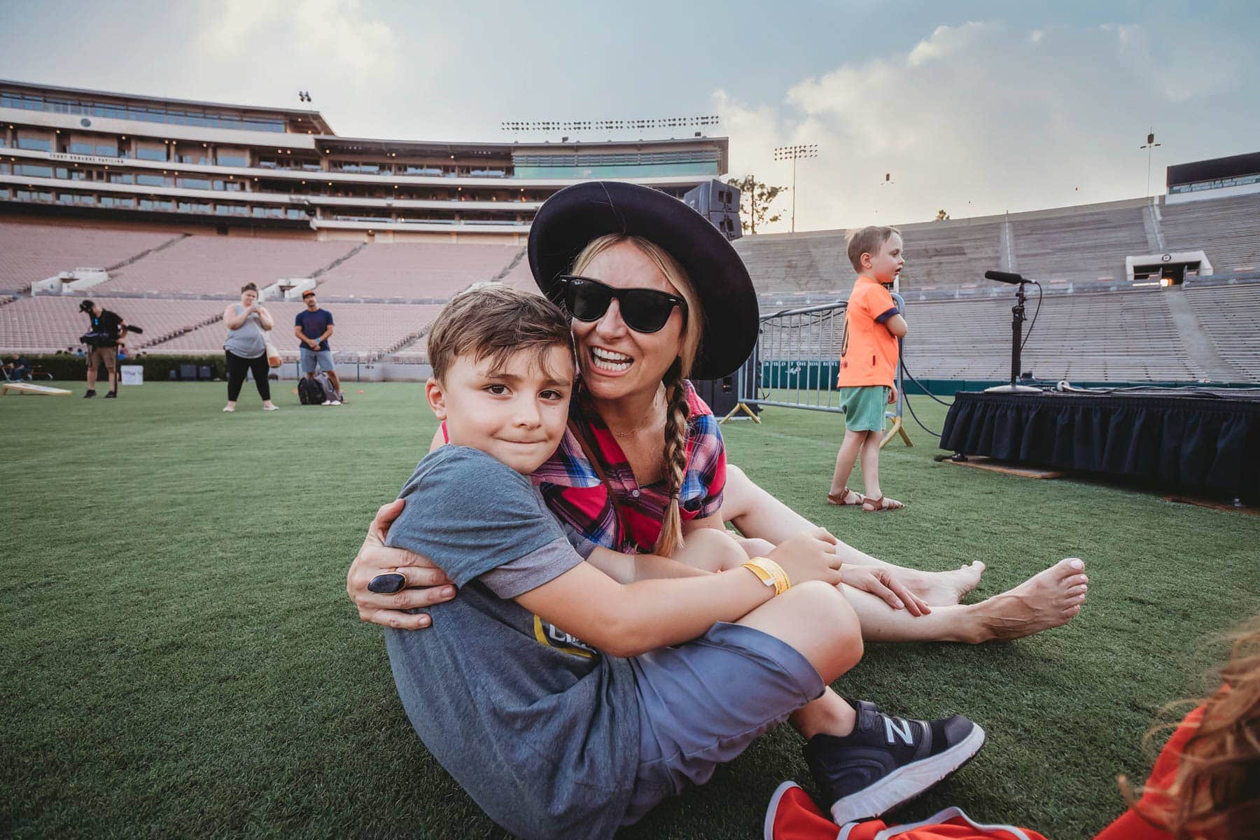 Childhood Cancer is an awful diagnosis. All kids deserve a night to remember and that's exactly what Northwestern Mutual did for their night to remember at the Rose Bowl Stadium! #childhoodcancerawareness #rosebowlstadiumcampout #campoutforkids #cancerawareness #rosebudscampout #rosebowlstadium #pasadena #california #citygirlgonemom #camping #footballstadium