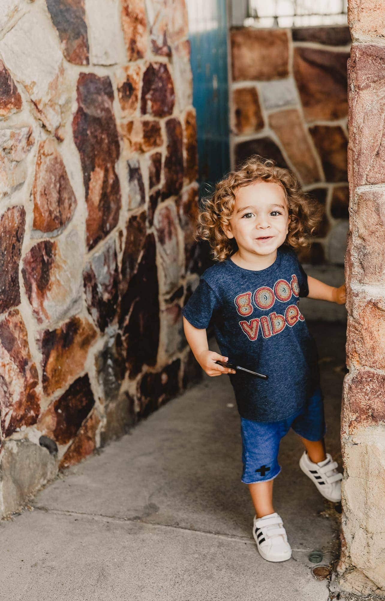 toddler with cell phone