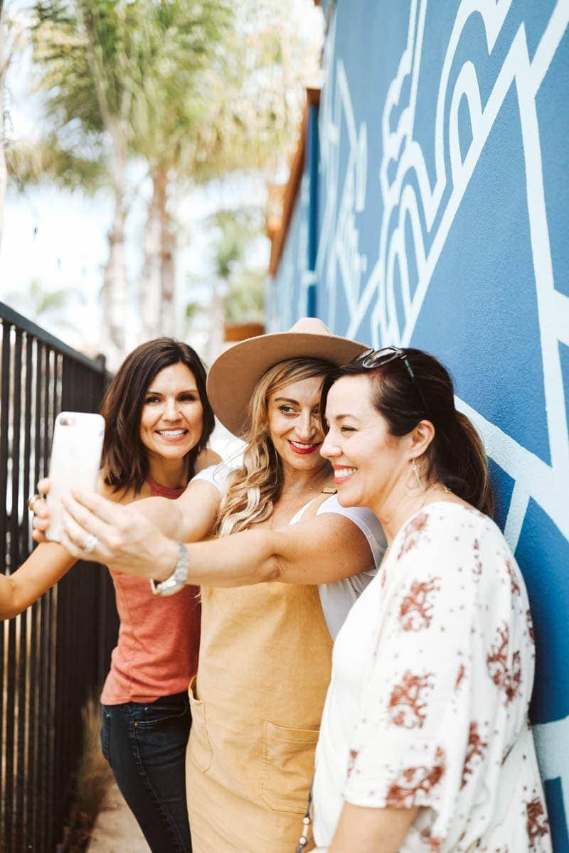 girls taking selfie