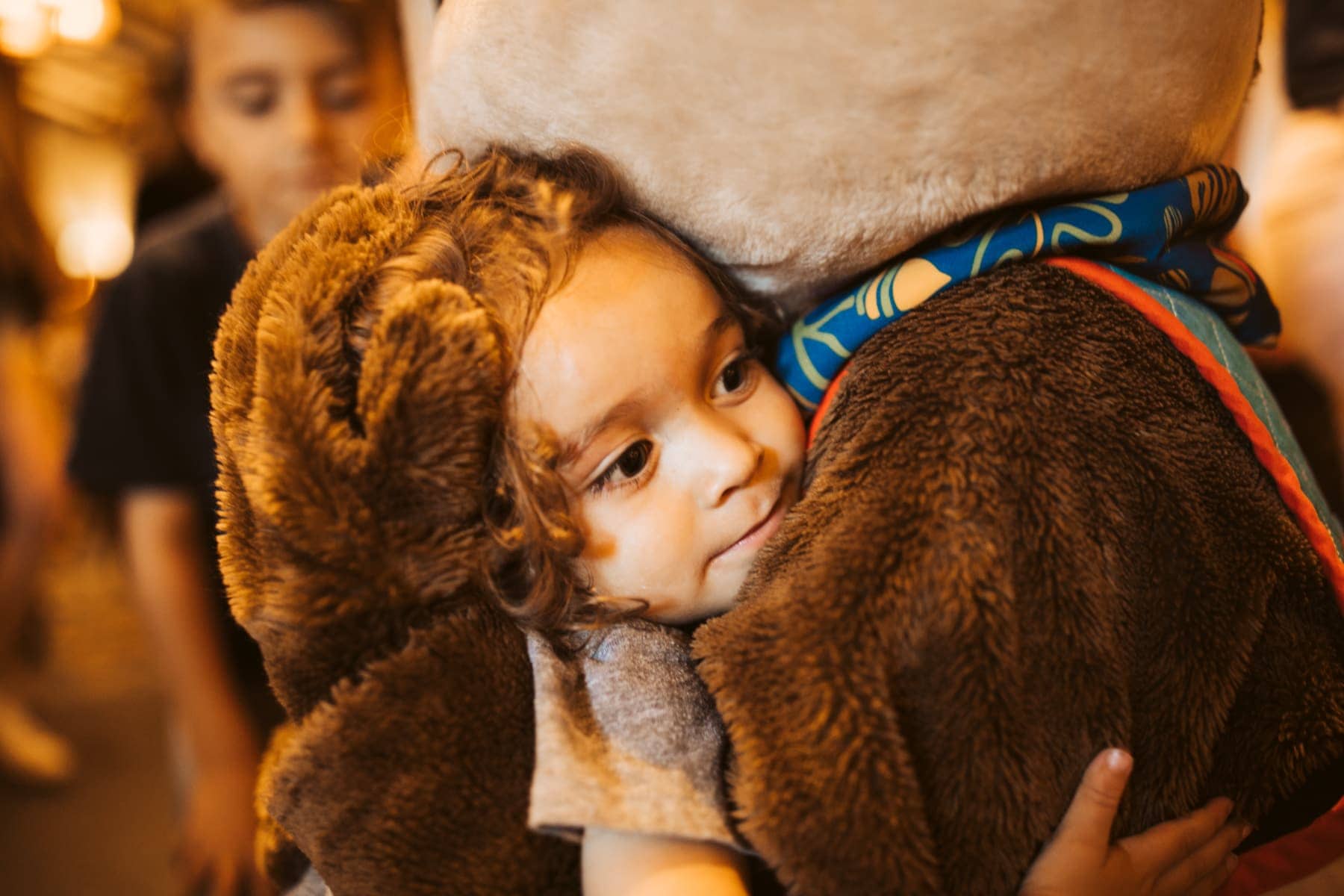 toddler hugging character