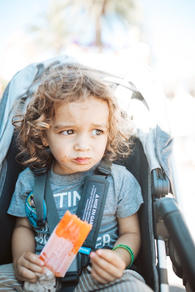 boy eating popsicle