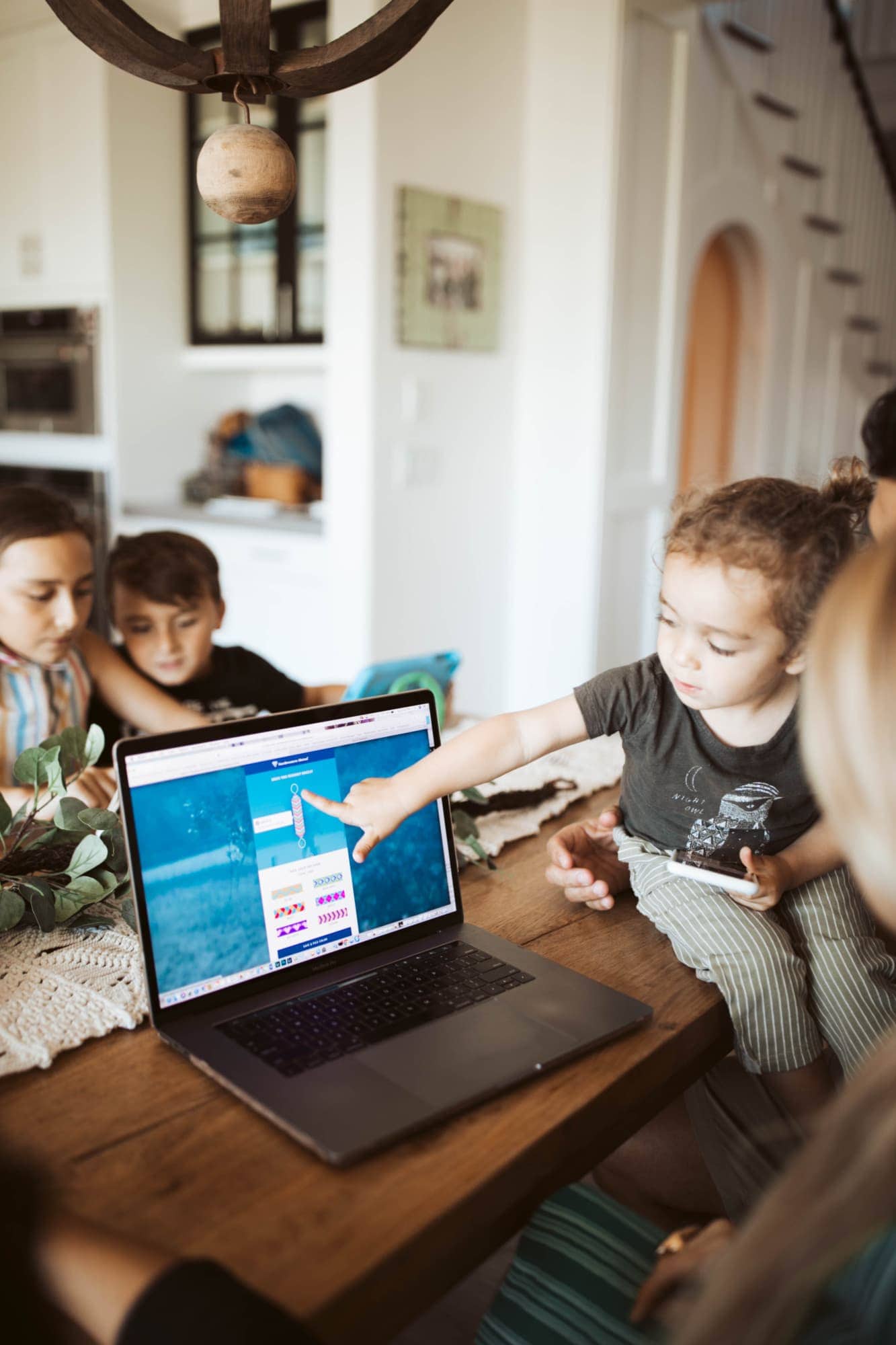 family looking at computer